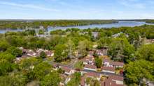 Even more water to the North! Boat launches and picnic & recreation spots are all around. Unit 4803 is the 2nd garage from the right, next to green space & white van.