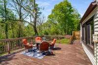 Expansive back deck runs the full length of the condo and allows for year round entertaining and nature watching. It's tough to have a bad day out here.