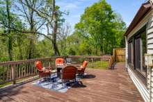 Expansive back deck runs the full length of the condo and allows for year round entertaining and nature watching. It's tough to have a bad day out here.