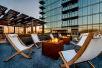 Fire pits on the green roof are the perfect places to gather with guests before heading out for dinner in the many incredible food options in the Gulch