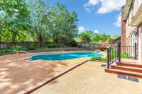 The favorite fun spot of the house is the inviting inground pool with a brand new salt water system.  Such a wonderful spot to entertain or relax. Don't miss seeing  the large open area behind the back pool fence for play or sports activities.