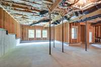 The unfinished daylight walkout basement presents a blank canvas awaiting your personal touch, with the promise of expanding your living space and enhancing your home experience. Builder can finish basement to YOUR specific needs!