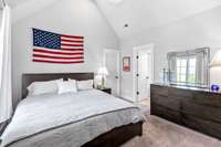 Bedroom 2 upstairs with full bath. This bedroom also has vaulted ceiling