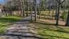 THE LONG WINDING DRIVEWAY AS YOU ENTER OR EXIT THE 1.65 ACRES IS SIMPLY GORGEOUS.