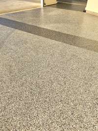 Professionally installed Epoxy coated garage floors. Easy to clean and maintain.