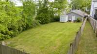 Spacious backyard fully fenced in for extra privacy.
