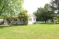 Almost a half acre lot with lots of room in front and back yard to enjoy