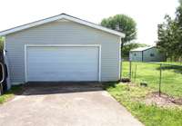 22x26 garage, paved driveway with lots of parking area.