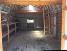 Interior of extra large storage shed, has power and lighting!