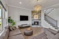 Spacious Living room with cozy fireplace.