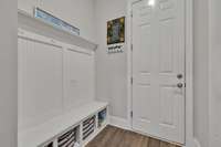 Spacious mudroom before Garage entrance