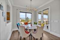 Large breakfast nook that opens to covered porch.  Upgraded porch was installed during build.