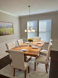 Formal Dining room - Virtually staged can accommodate 6 or even 8 guests or family comfortably