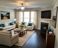 Virtual staging shows how this open concept Living room will entice your visitors to sit and stay a while...