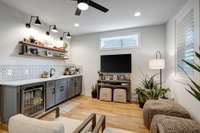 Custom Wood floating shelves to remain above the huge wet bar area