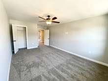 Bedroom 3 at 16'x11' (photo is of model home with same floor plan)