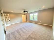 Bonus room upstairs (photo is from staged model home with same layout)