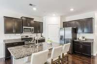 The kitchen offers lots of cabinet and countertop space!