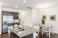 The kitchen in this unit is just WOW! Large island is perfect for extra seating, prepping, and serving.