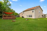 The spacious, beautiful backyard offers a perfect outdoor haven for kids and pets to play and explore.  809 Brooksdale Dr Smyrna, TN 37167