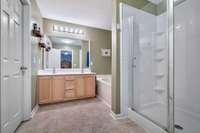 Just off of the primary bedroom is the luxurious bathroom of your dreams!