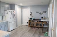 Kitchen pantry and entrance into laundry room.