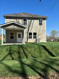 The home sits securely and looks down on the private backyard and the White House walking trail