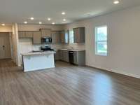 The dining area will seat lots of family and friends at that holiday gathering.