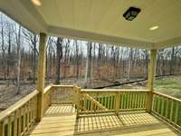 Your covered back deck is perfect for taking in the private view of the Greenway and for having the perfect spot for those summer cookouts.