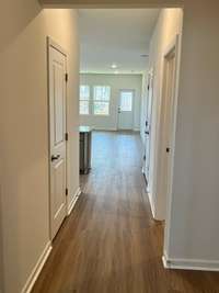 Notice the front to back open plan as you enter the home