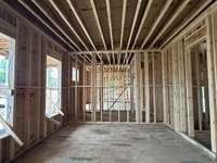 Formal Dining room with Butler's Pantry this home is under construction Built by Ford Classic Homes Photo taken 4/19/2