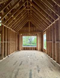 Primary Bedroom Retreat with vaulted ceiling this home is under construction Built by Ford Classic Homes Photo taken 4/19/2