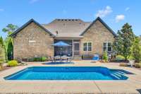 Welll manicured landscaping surrounds the home.