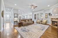 The living room is open to the kitchen and dining area.