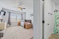 Bedroom 4 with adjacent bathroom. Be sure and notice the extra storage in this bedroom's closet.