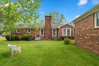 BEAUTIFUL BACK YARD OFFERS LOTS OF ROOM FOR ENTERTAINMENT