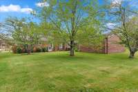 LARGE BACKYARD WITH TREES OFFERS PRIVACY