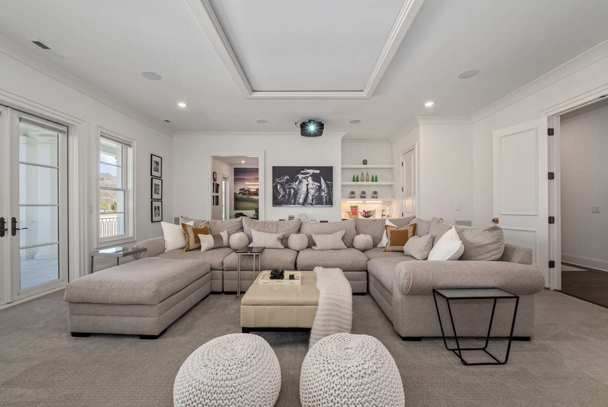 Theater with office in the back ground.
Walk out to Covered Porch.  Overlooks Pool, Spa, & Golf Course