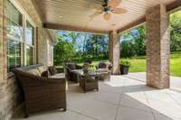 Walk out from the family room and relax on the covered backporch to soak in the sounds of nature.