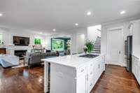 The back staircase is perfectly situated between the pantry and the back hallway.