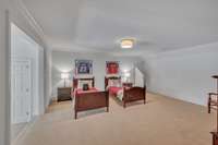 One of the upstairs bedrooms; has plenty of room for 2 beds and access to the bonus/playroom