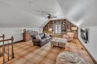 Upstairs bonus/playroom with built-ins