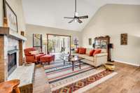 Living Room view to back of the home and Sunroom