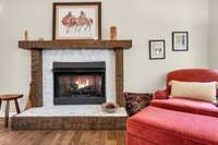 Living Room features Gas Log Fireplace