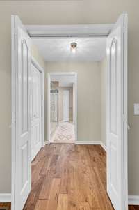 1st Primary Bedroom private closet area leading to the Private Bath