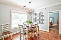 Your eat-in kitchen looks out to your privacy fenced yard.