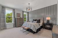 Another upstairs bedroom with walk in closet and Ensuite bath.  Photo is for informational purposes and is of a decorated Ballentine model home. Differences will exist.