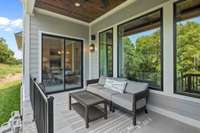 Another view of the rear covered porch.  Photo is for informational purposes and is of a decorated Ballentine model home. Differences will exist.