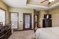 This bedroom also has access to the covered back porch