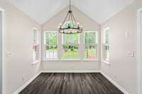 We love this breakfast nook. Windows on 3 sides allow for lots of light to flood this space!